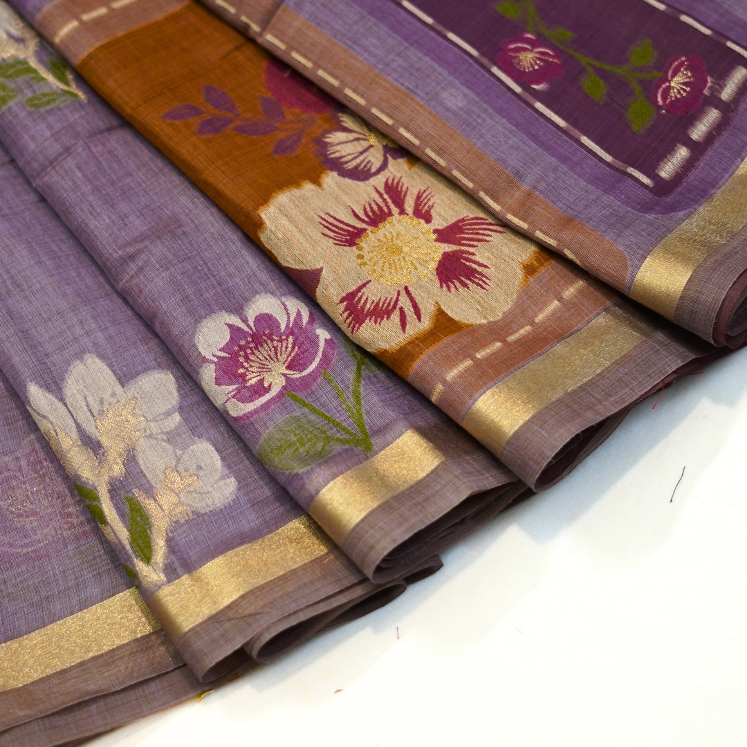 Silk cotton saree with Jamdhani floral weaving.