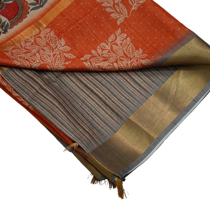 Printed tussar with zari and kalamlari.