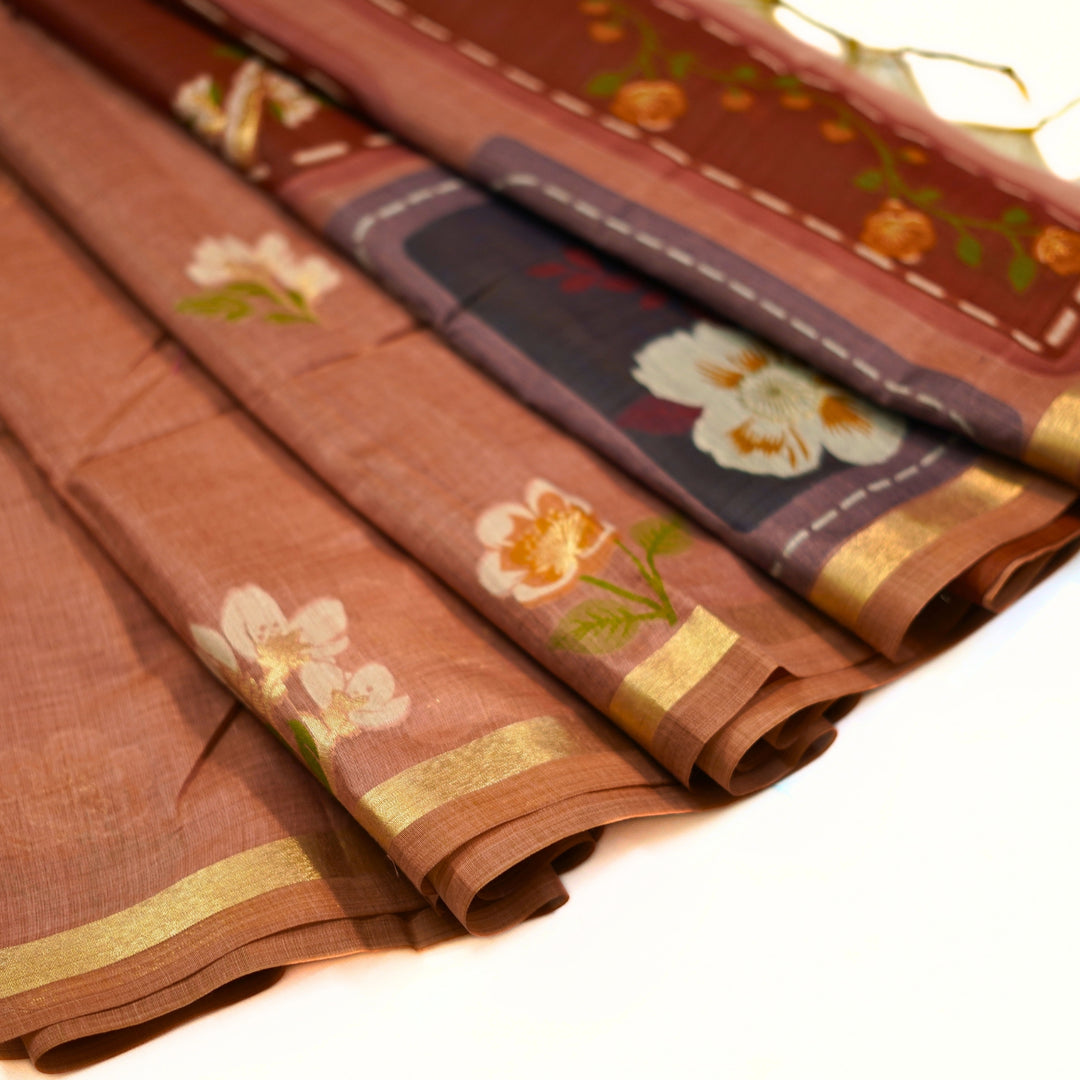Silk cotton saree with Jamdhani floral weaving.