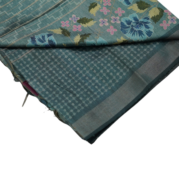 Raw silk saree with all over geomentrical design and floral weaving border.