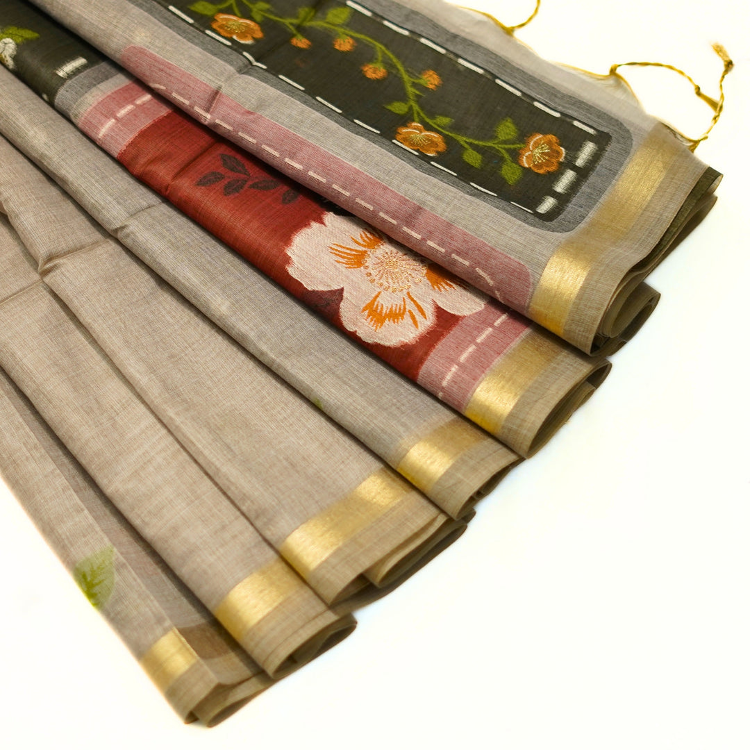 Silk cotton saree with Jamdhani floral weaving.