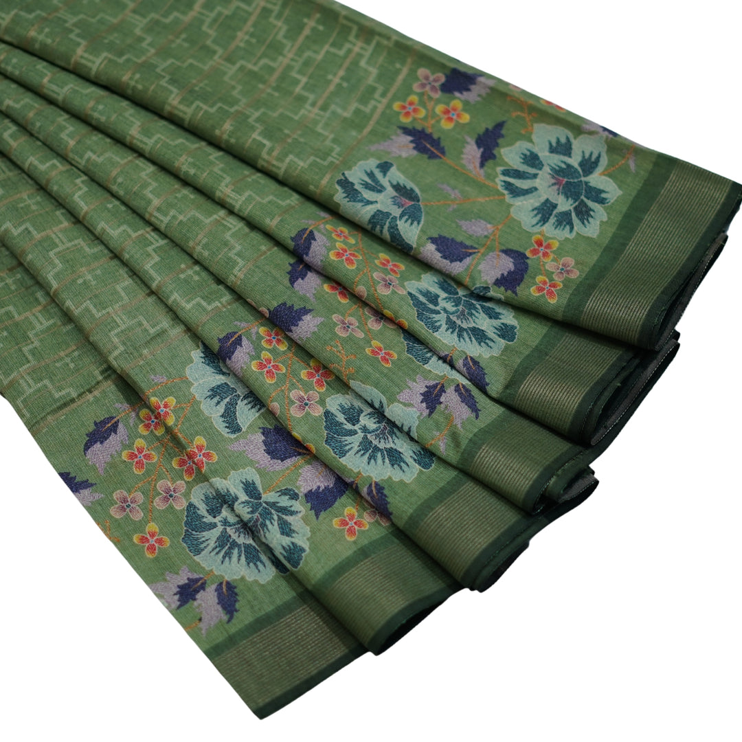 Raw silk saree with all over geomentrical design and floral weaving border.
