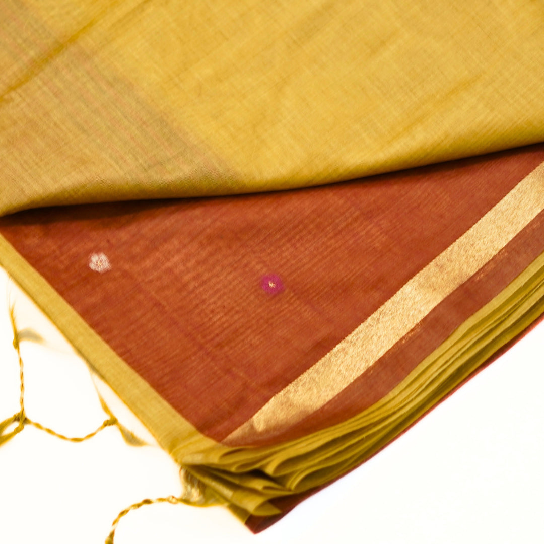 Silk cotton saree with Jamdhani floral weaving.