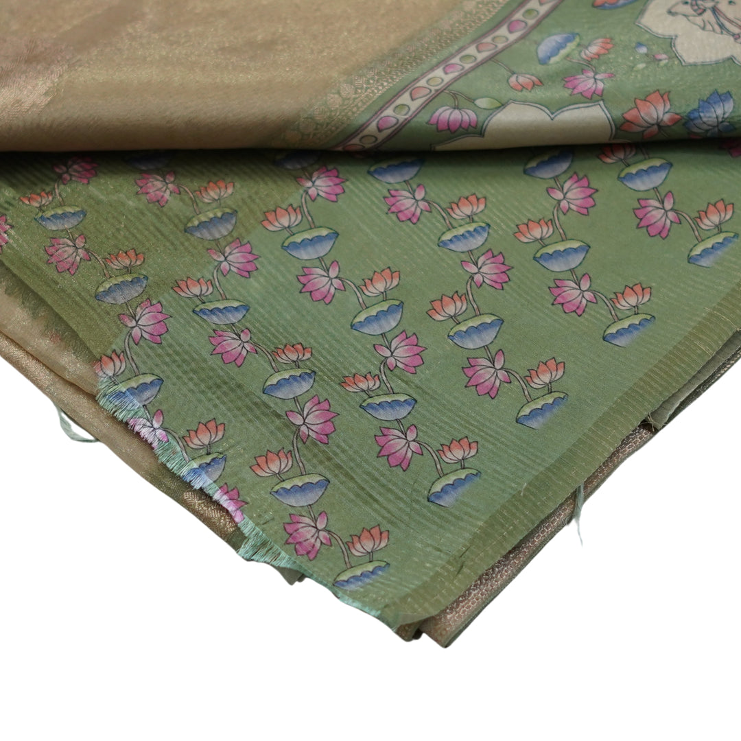 Tissue organza saree with pichuvai satin border.