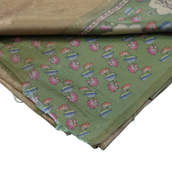 Tissue organza saree with pichuvai satin border.