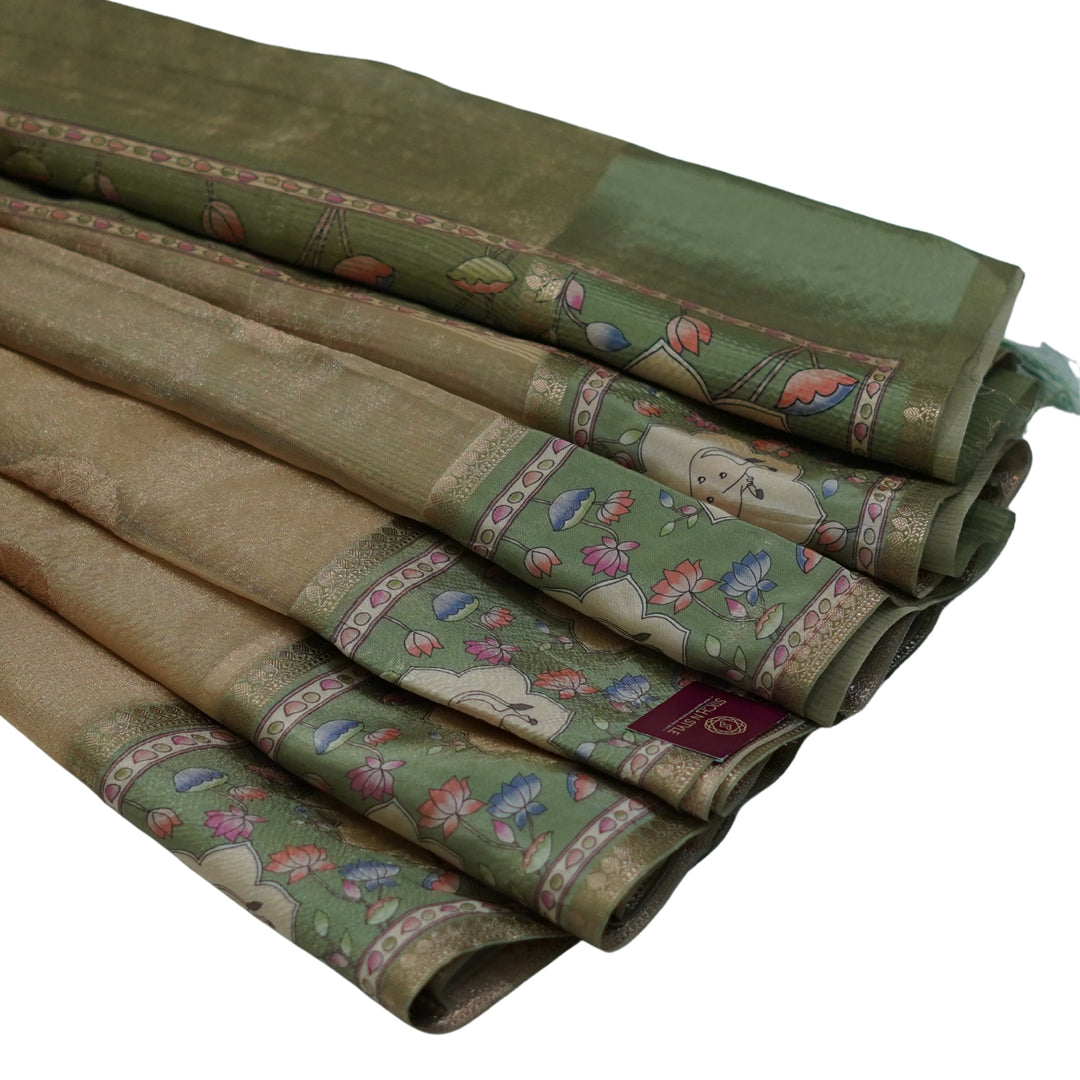 Tissue organza saree with pichuvai satin border.
