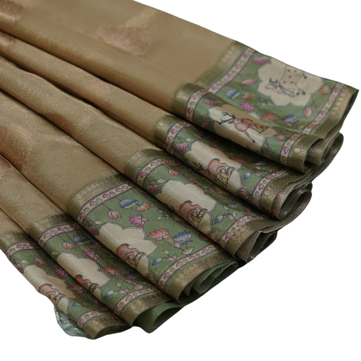 Tissue organza saree with pichuvai satin border.