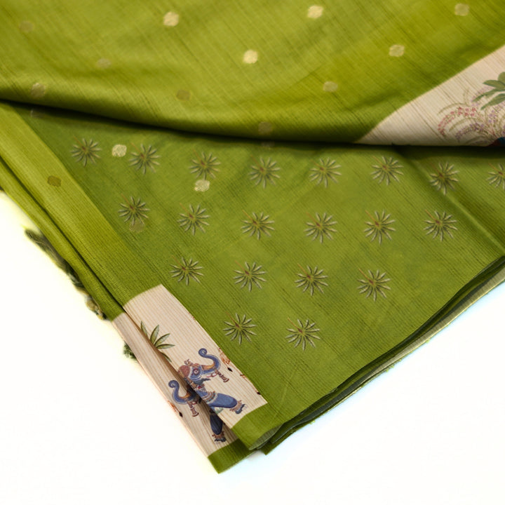 Silk cotton saree with all over buttas and digital print border.