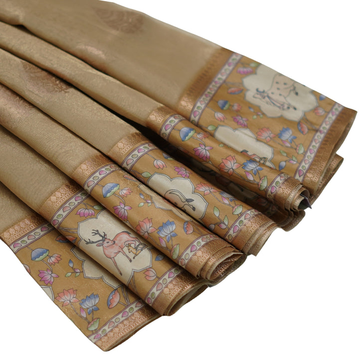 Tissue organza saree with pichuvai satin border.