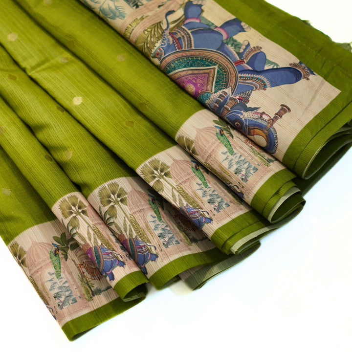 Silk cotton saree with all over buttas and digital print border.