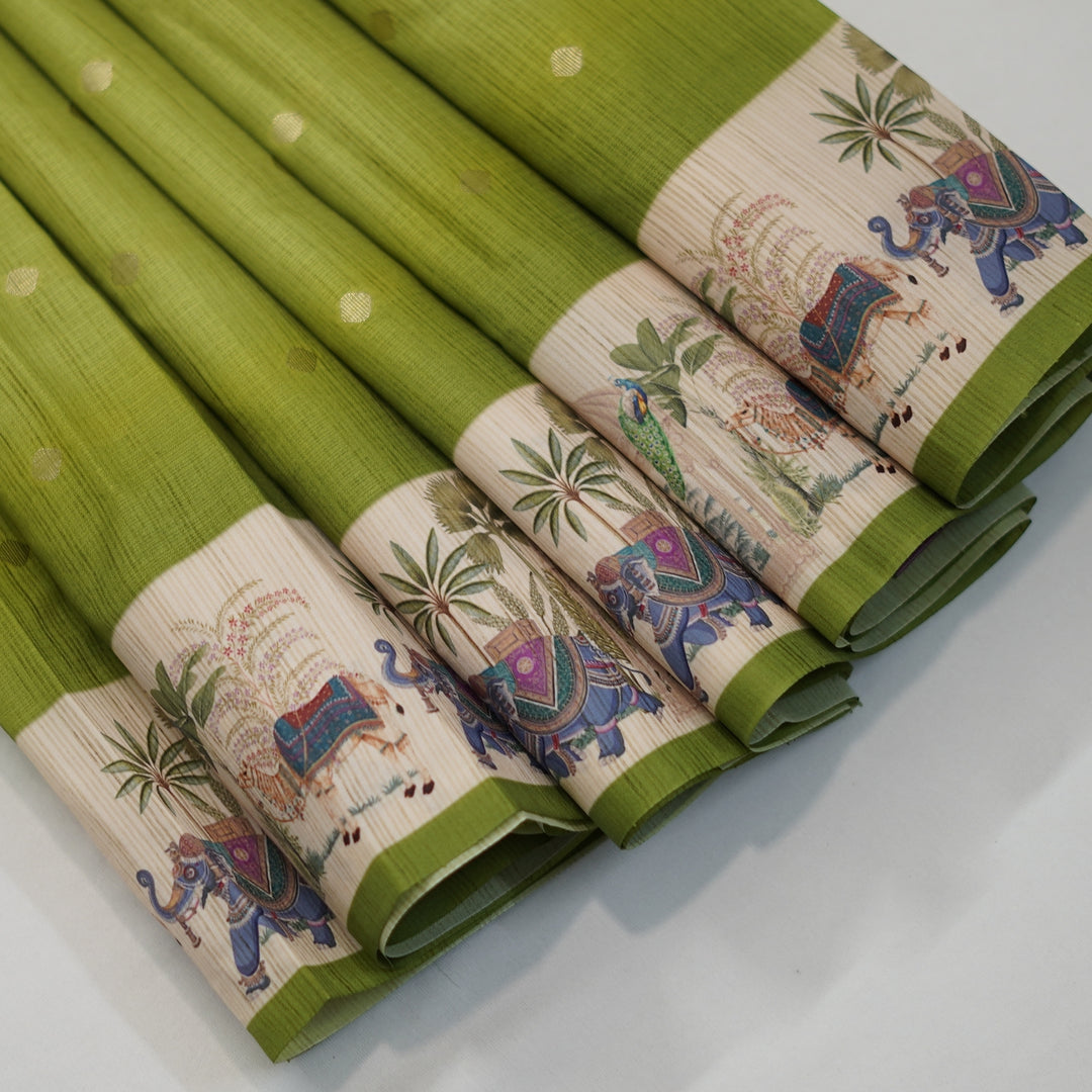 Silk cotton saree with all over buttas and digital print border.