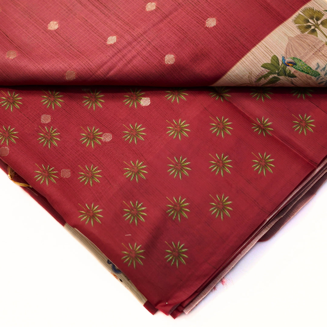 Silk cotton saree with all over buttas and digital print border.