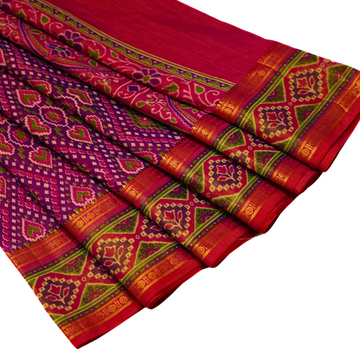 Raw silk saree with pochampalli design and tissue zari weaving.