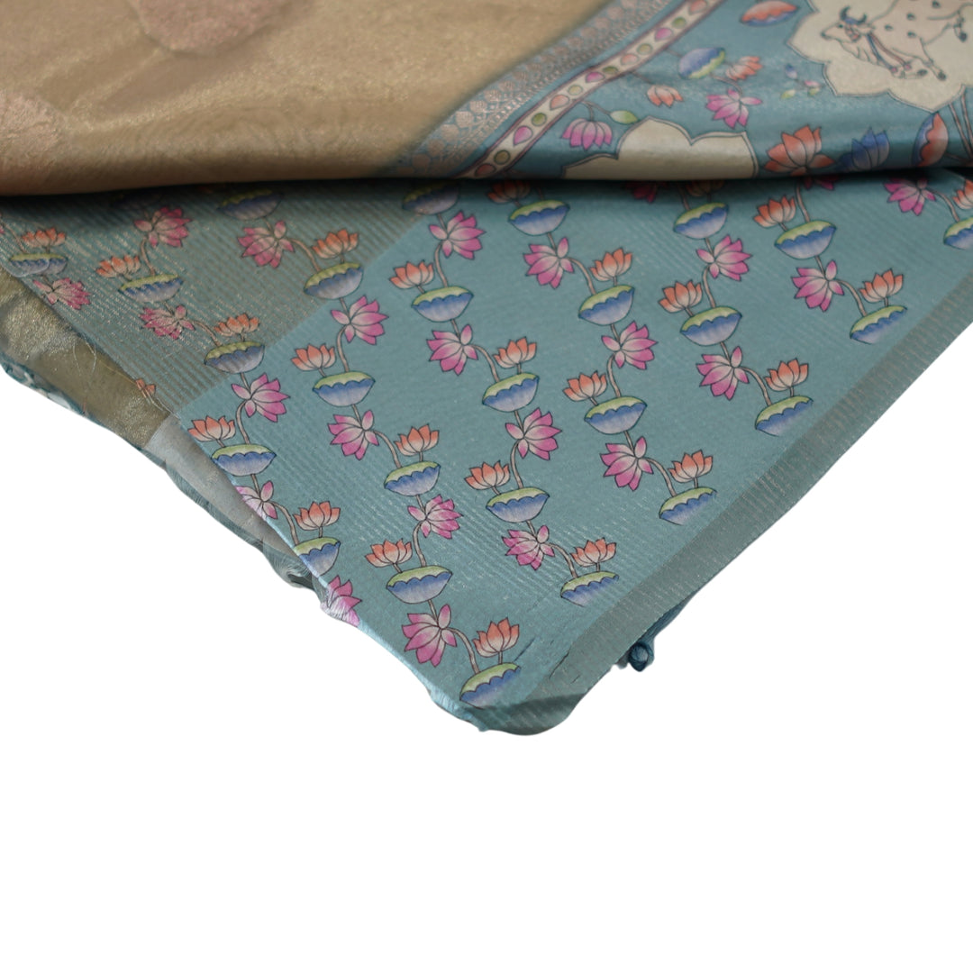 Tissue organza saree with pichuvai satin border.