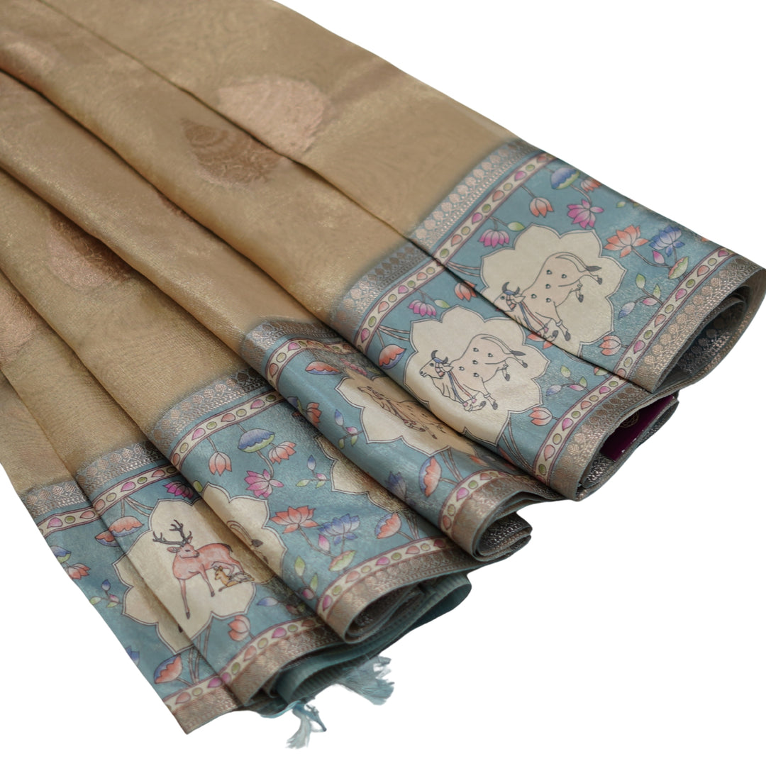 Tissue organza saree with pichuvai satin border.