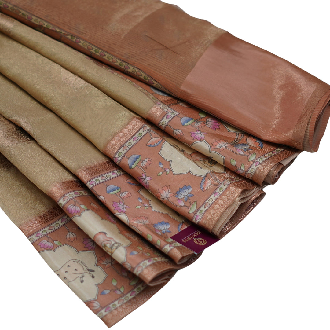 Tissue organza saree with pichuvai satin border.