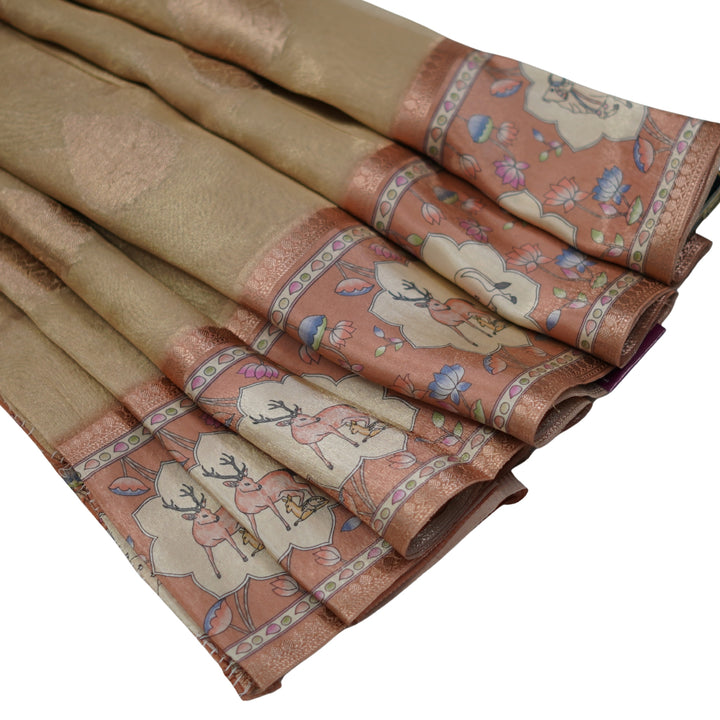 Tissue organza saree with pichuvai satin border.