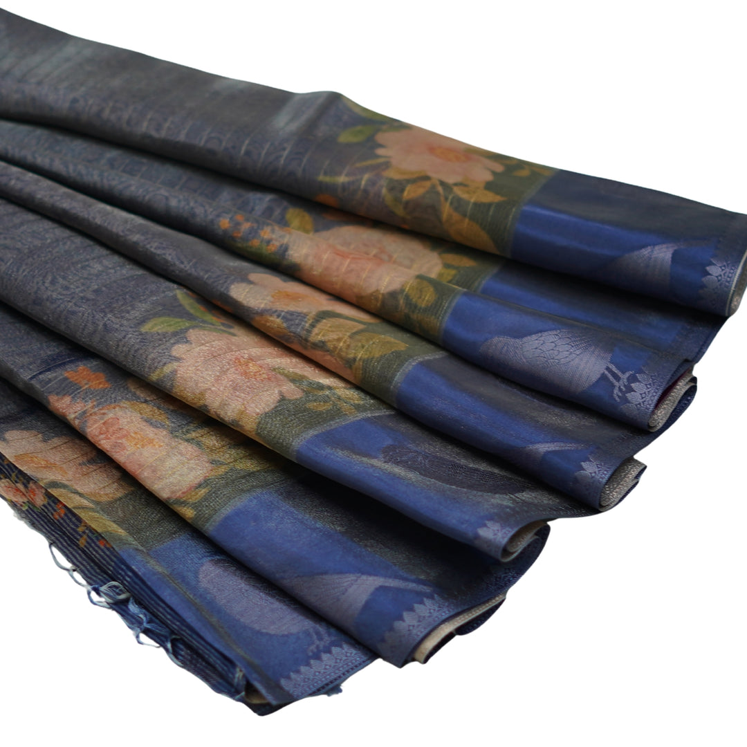 Tissue organza saree with all over lines and digital print.