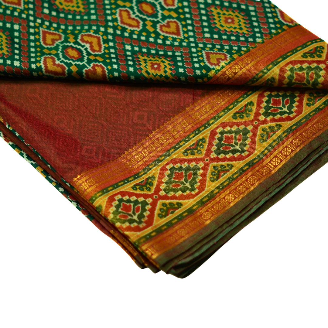 Raw silk saree with pochampalli design and tissue zari weaving.