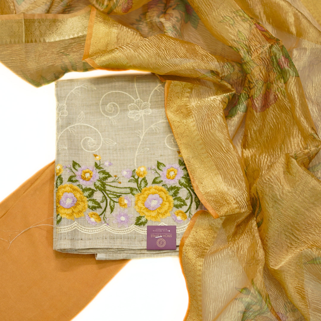 Tissue salwar with crushed tissue dhupatta with zari border.