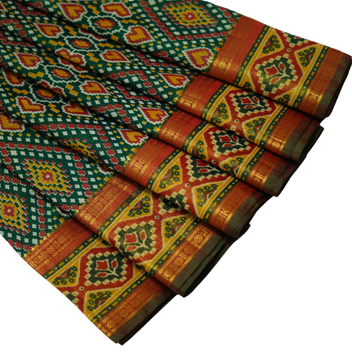 Raw silk saree with pochampalli design and tissue zari weaving.