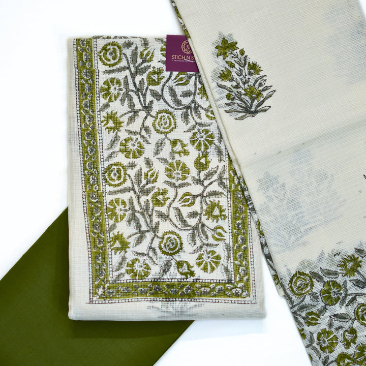 Kotta cotton salwar with kotta dhupatta and floral yoke.