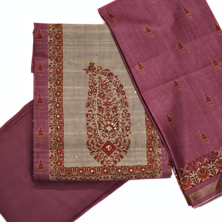 Tussar salwar set with neck yoke work and embroidery and tussar dhupatta.