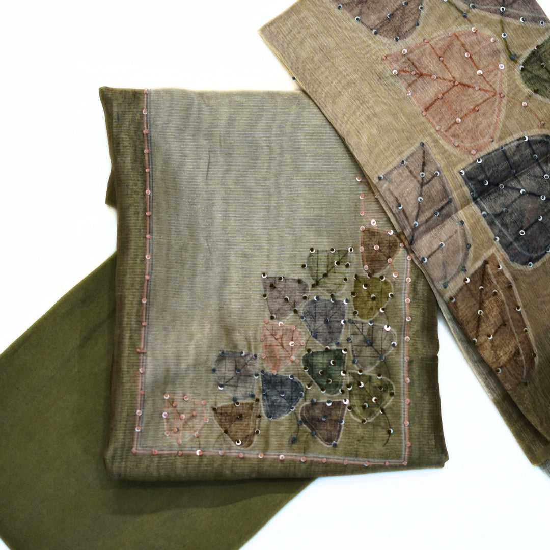 Organza yoke with hand work and tussar dhupatta.