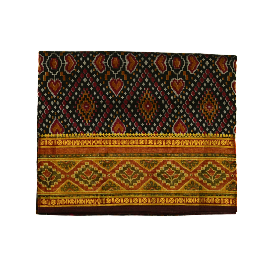 Raw silk saree with pochampalli design and tissue zari weaving.