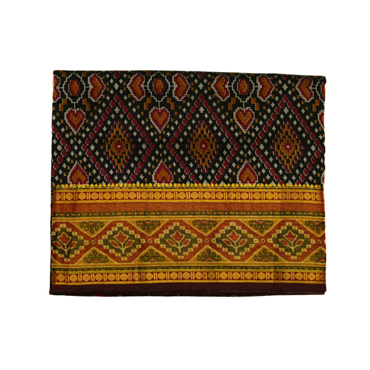 Raw silk saree with pochampalli design and tissue zari weaving.