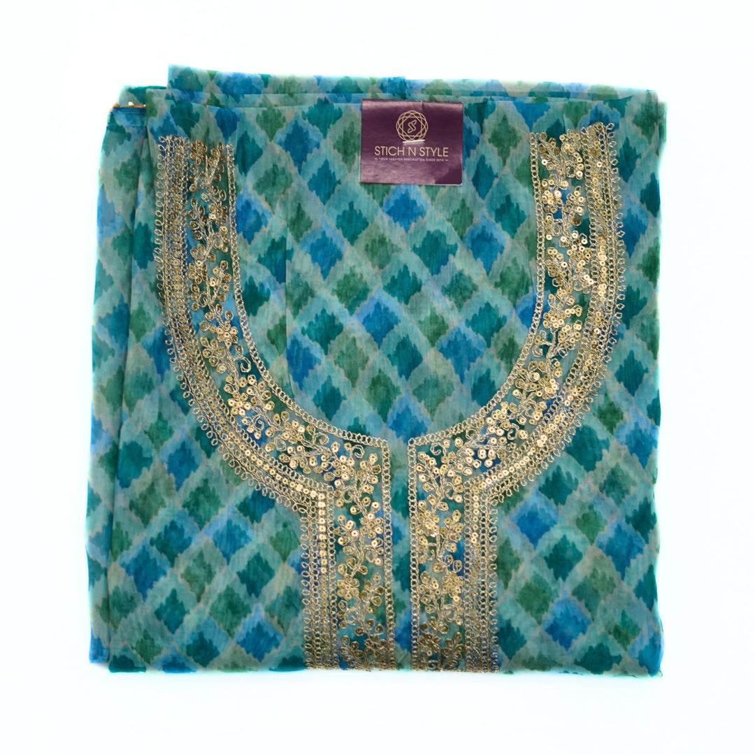 Organza salwar set with neck zari and organza dhupatta.