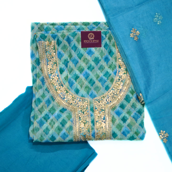 Organza salwar set with neck zari and organza dhupatta.