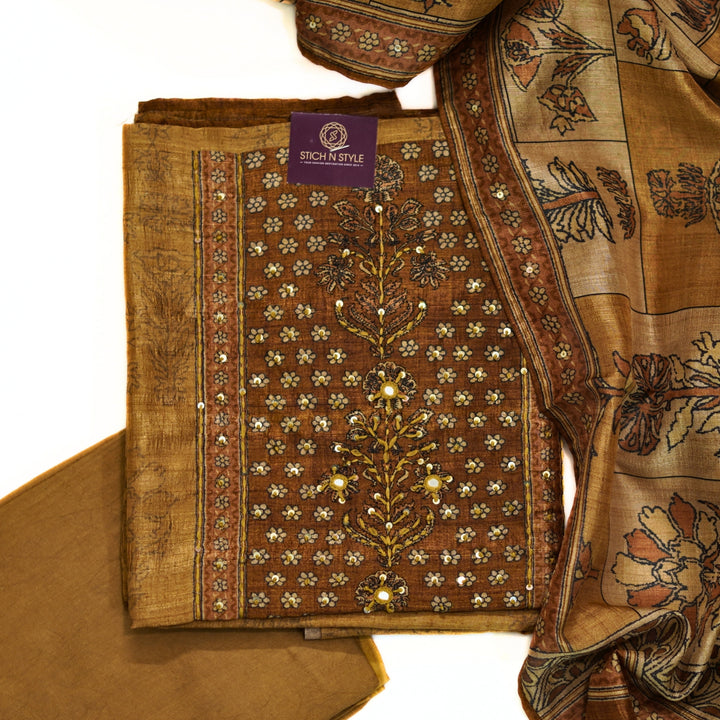 Tussar salwar set with yoke print and hand work and tusser dhupatta with digital print.