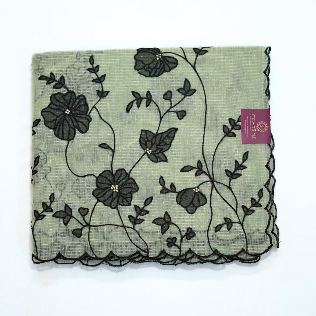 Tissue kotta saree with all over floral aplique work.