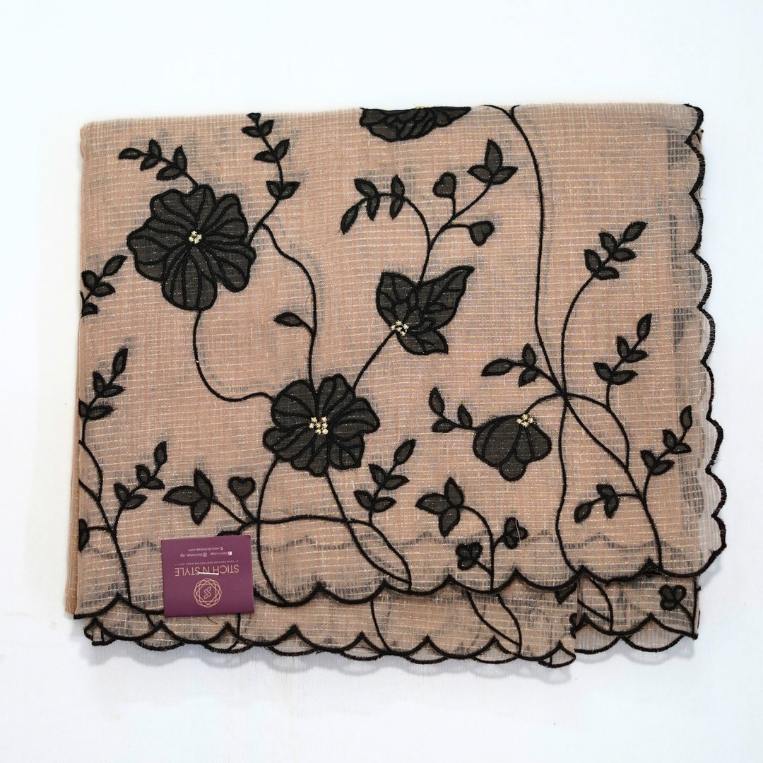 Tissue kotta saree with all over floral aplique work.