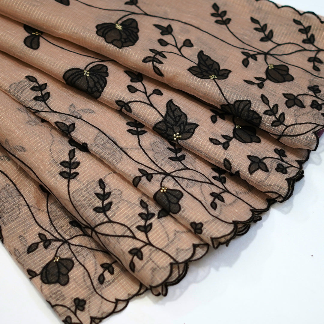 Tissue kotta saree with all over floral aplique work.