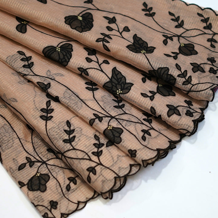 Tissue kotta saree with all over floral aplique work.