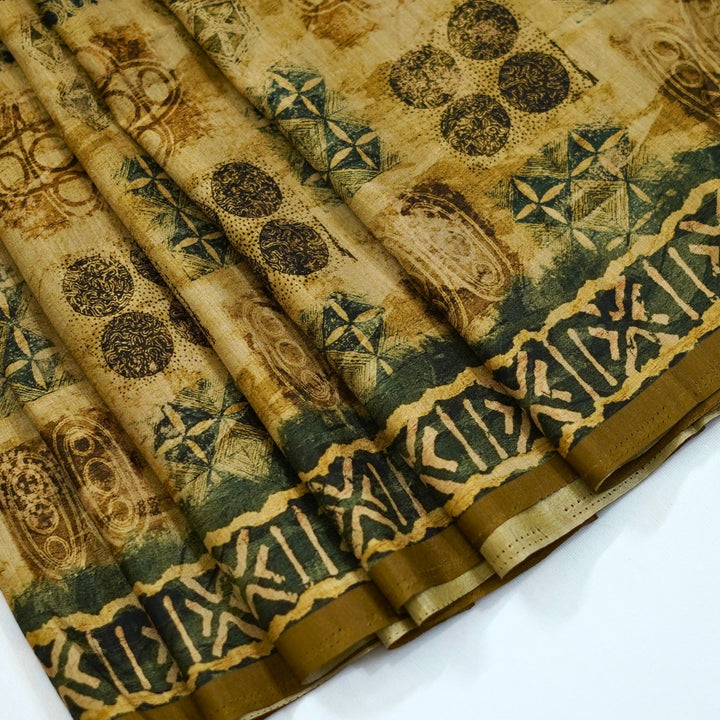 Semi tussar saree with geomentrical print all over, with a beautiful border for office wear.