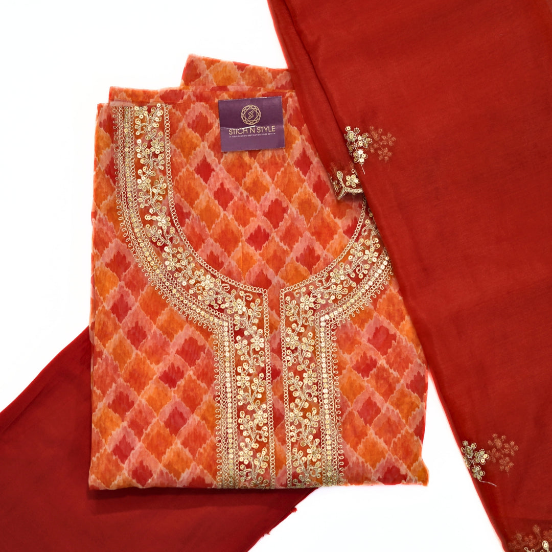 Organza salwar set with neck zari and organza dhupatta.