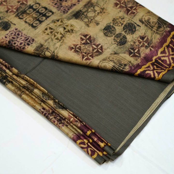 Semi tussar saree with geomentrical print all over, with a beautiful border for office wear.