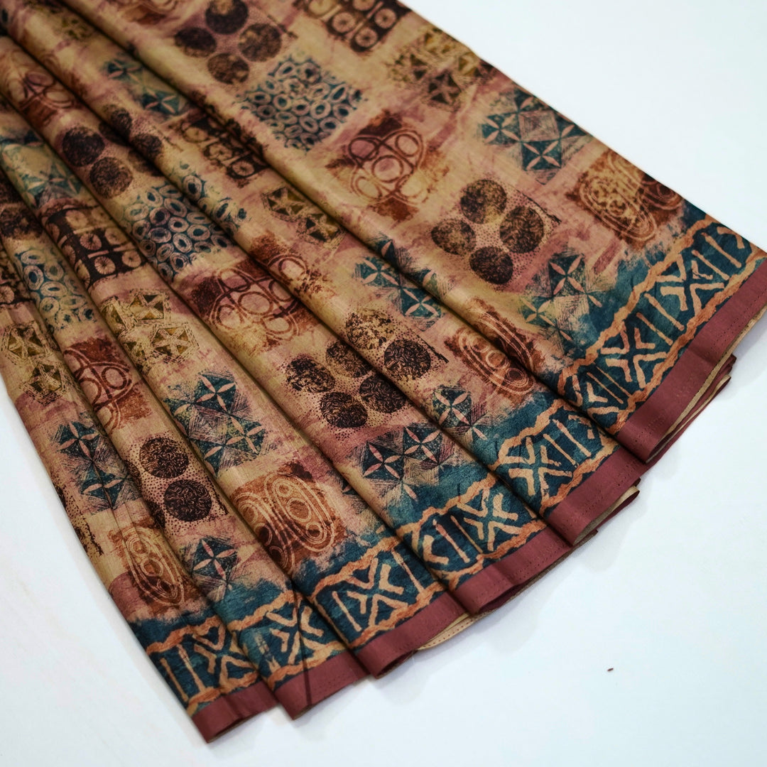 Semi tussar saree with geomentrical print all over, with a beautiful border for office wear.