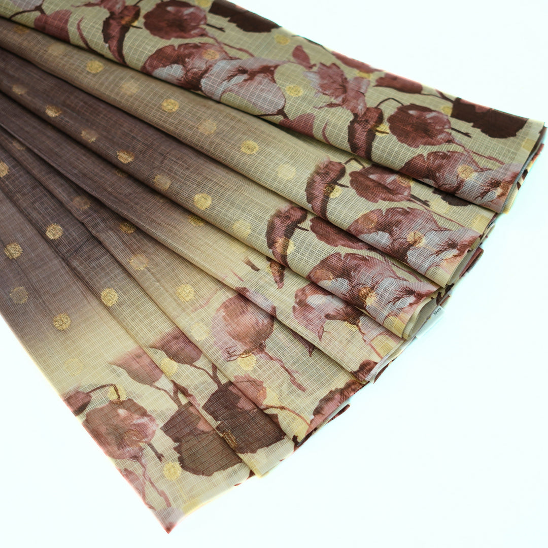 Kotta saree with all over zari butta and digital print floral border.