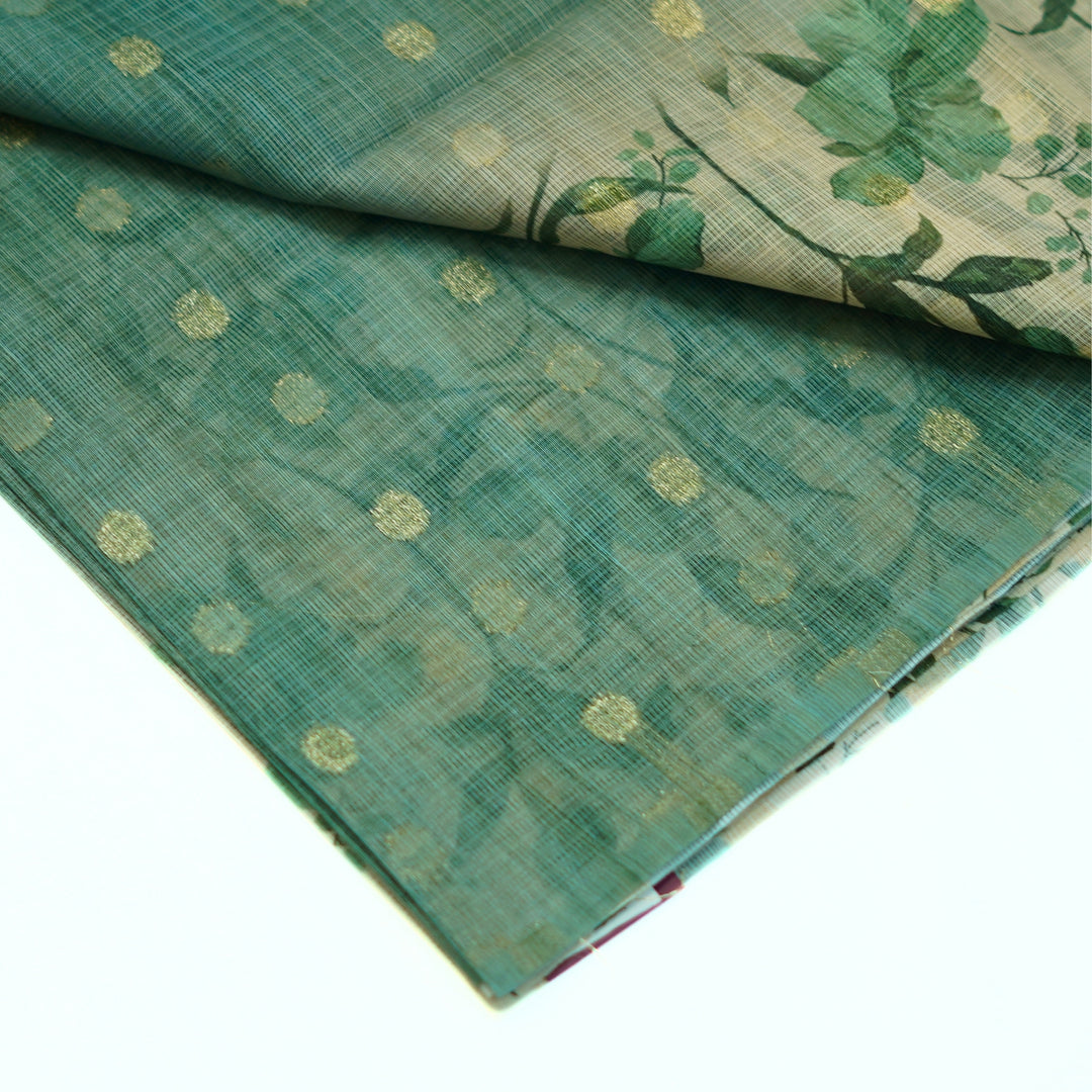 Kotta saree with all over zari butta and digital print floral border.