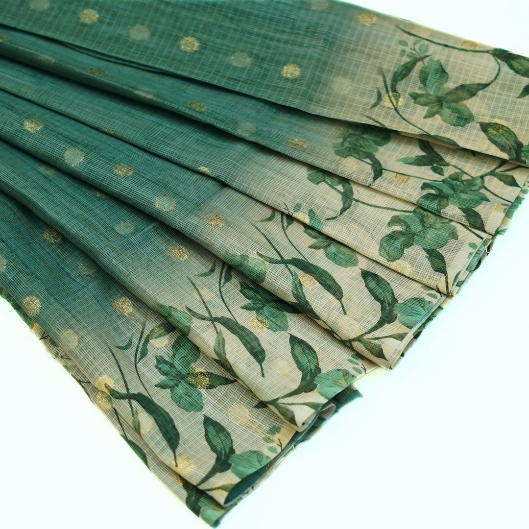 Kotta saree with all over zari butta and digital print floral border.