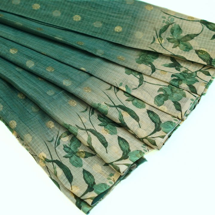 Kotta saree with all over zari butta and digital print floral border.