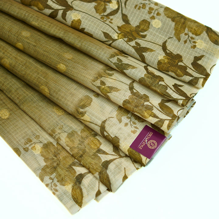 Kotta saree with all over zari butta and digital print floral border.