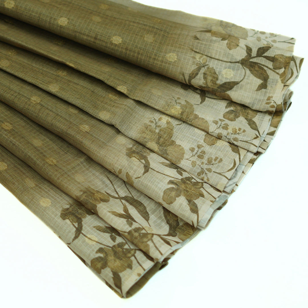 Kotta saree with all over zari butta and digital print floral border.