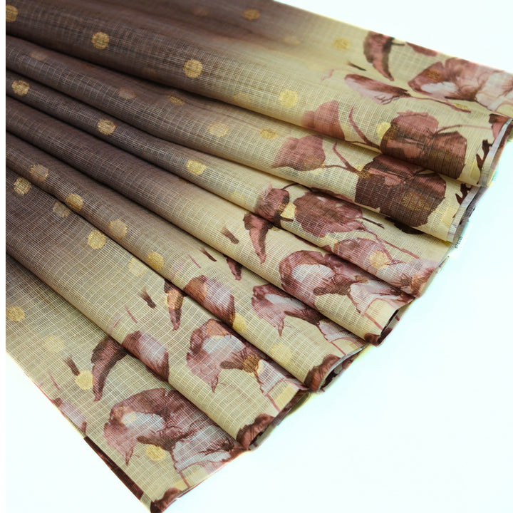 Kotta saree with all over zari butta and digital print floral border.