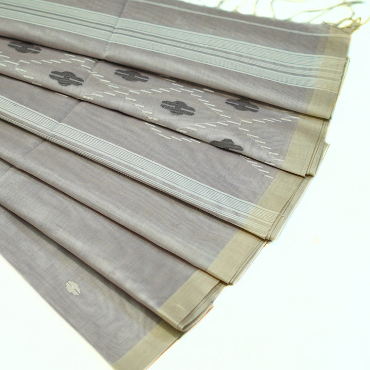 Pure bengal cotton saree with buttas all over, with rich pallu.