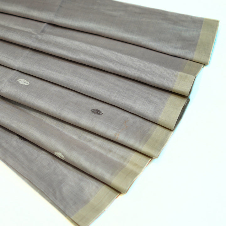 Pure bengal cotton saree with buttas all over, with rich pallu.